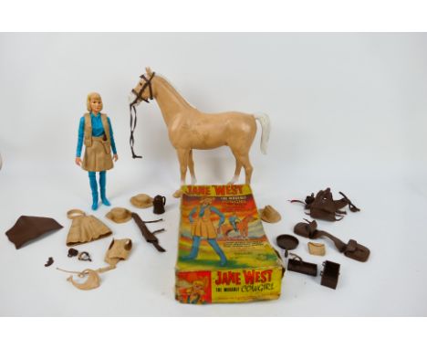 Marx - A boxed Jane West Cowgirl figure with accessories and an unboxed horse. They show signs of use and would benefit from 