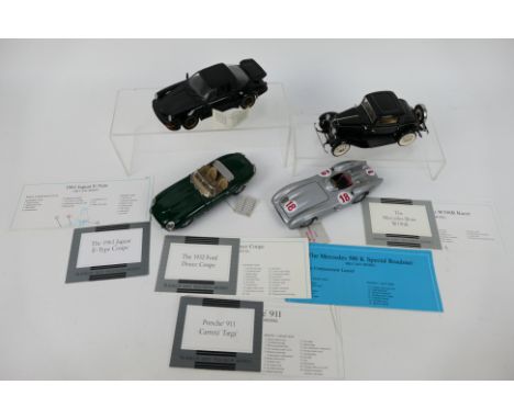 Franklin Mint - Four unboxed 1:24 scale diecast model cars from Franklin Mint. Lot consists of a 1998 Porsche 911 Targa; 1961