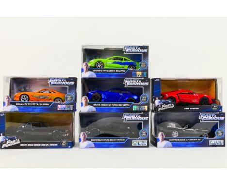 Fast &amp; Furious - Jada Toys. A selection of Seven boxed modern Jada, Fast &amp; Furious 1:24 scale diecast vehicles appear