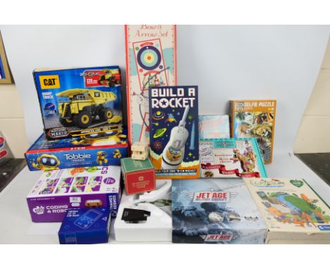 Atlas - Superetro - A collection of games, toys and model kits including Build A Rocket, Coding &amp; Robotics, a walking Aut