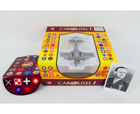 Carousel 1. A boxed Carousel 1 #6123 P-36A HAWK, Major Kenneth Walker, MoH. Item appears in Mint condition with Excellent box