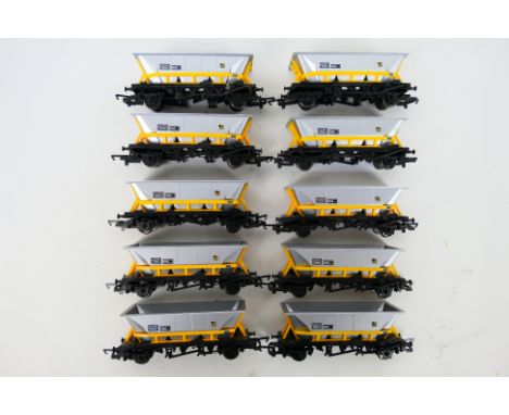 Hornby - An unboxed set of 10 x OO gauge coal sector hopper wagons # R033. They show some signs of use and appear in Good con
