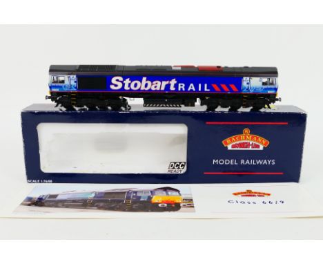 Bachmann - A boxed OO gauge Class 66/9 Diesel in DRS/Stobart livery operating number 66411 # 32-977 The box is labelled DCC R
