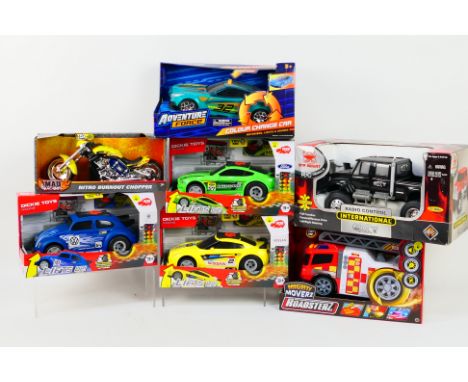 Mad Machine Toys - Dickie Toys - Remote control cars. A selection of Eight boxed RC vehicles appearing in Excellent condition