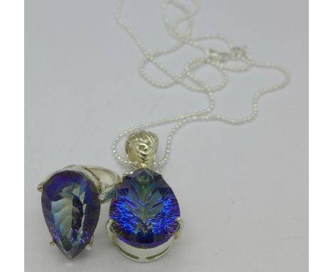 A silver and mystic topaz ring and a necklace with a mystic topaz pendant