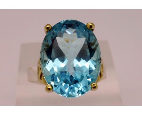 A 9ct gold and blue topaz ring, weight 10.3g, size N