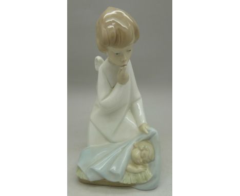 A Lladro figure, height 17cm