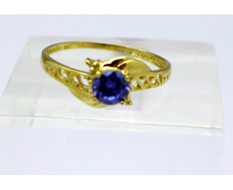 A 9ct gold and blue stone ring, weight 1g, size O