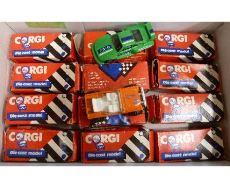Twelve Corgi cars and vans, boxed