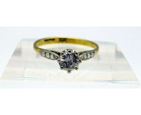 An 18ct gold, platinum set diamond solitaire ring, weight 1.8g, size M