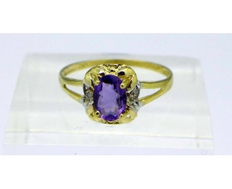 A 9ct gold, amethyst and diamond ring, weight 1.1g, size N