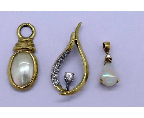A yellow metal and opal pendant, a yellow metal and pearl pendant and a yellow metal and cubic zirconia pendant, weight 4.1g