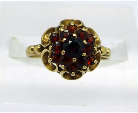 A 9ct gold and red stone ring, weight 2.3g, size K