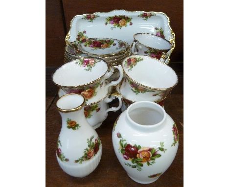 Royal Albert Old Country Roses including six sandwich plates, seven saucers and six cups, twenty-three pieces in total