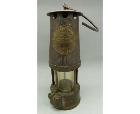 An Eccles miner's safety lamp