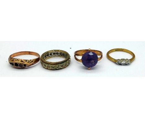 An 18ct gold and diamond ring, weight 2.3g, size M and three other gold rings, weight 7.4g, one a/f