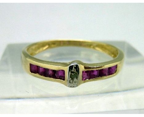 A 9ct gold, diamond and ruby ring, weight 1.1g, size N