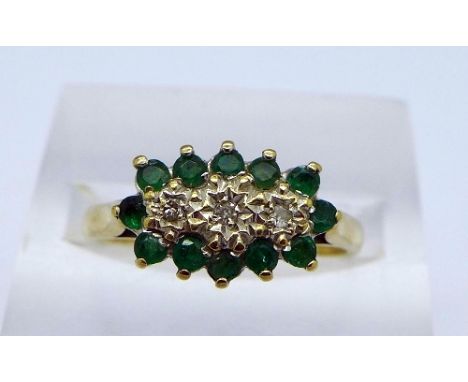 A 9ct gold, diamond and emerald ring, weight 2.8g, size Q