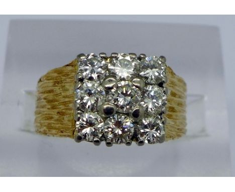 An 18ct gold and nine diamond cluster ring, approximately 1.4ct diamond weight, size N, total weight 8g