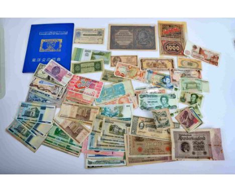A large selection of hundreds of overseas banknotes: including 3x Ceylon One Rupee 1921/22, Poland 1000 (P29), British Postal