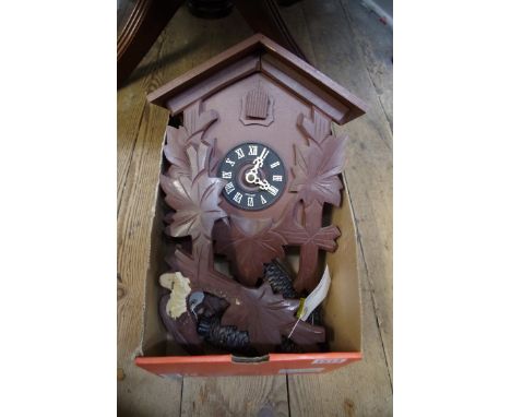 A German cuckoo clock, with weights.&nbsp; 
