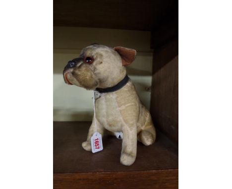 A vintage 'Made in Japan' plush bulldog radio. 