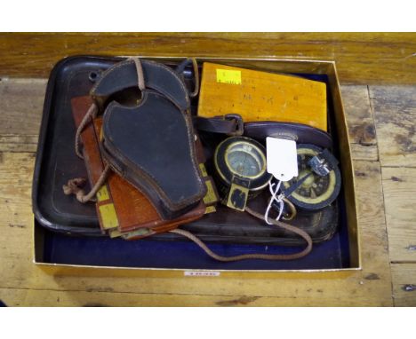 A mixed lot,&nbsp;to include two World War II period compasses; a camera plate; etc.&nbsp; 