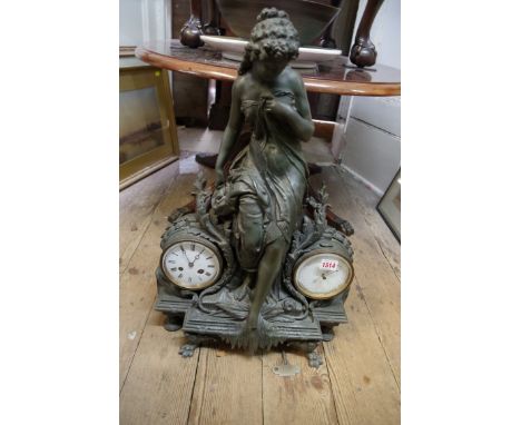 A late 19th century French spelter figural combined clock and aneroid barometer, the clock movement signed 'Hy Marc, Paris' a