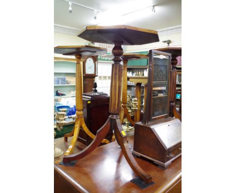 A pair of mahogany octagonal tripod tables, with reeded columns, 42cm wide. 