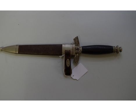 A German Third Reich 1934 NSFK Fleigermesser pilot's knife, by SMF Solingen, having 7cm blade, in scabbard with hanger, cross