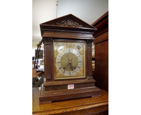 A circa 1900 oak architectural mantel clock,&nbsp;42cm high. 