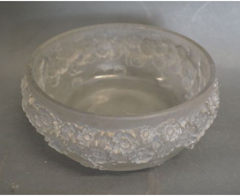 A Lalique Opalescent Glass Bowl decorated in relief with a foliate band impressed mark R Lalique, 16 cms diameter