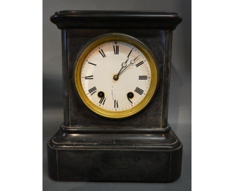 A Victorian Black Slate Mantle Clock, the enamel dial with Roman numerals and two train movement, 29 cms tall
