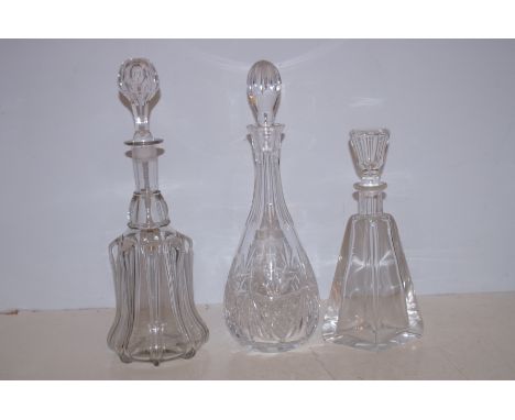 Cut Crystal Decanter together with 2 Early Decanters and a Cut Crystal Cigarette Lighter