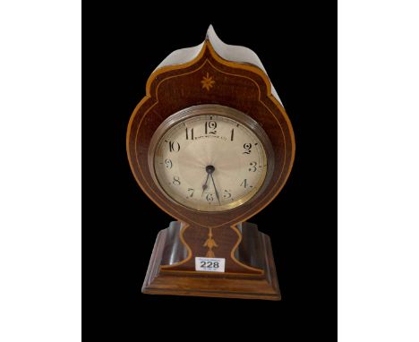 Inlaid mahogany balloon mantel clock, dial signed Bravingtons Ltd, London, 26cm.