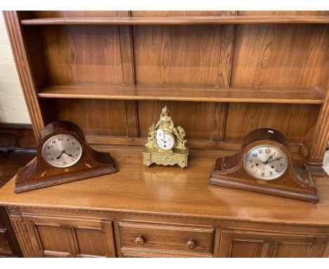 Two vintage inlaid mantel clocks and a gilt figural mantel clock.