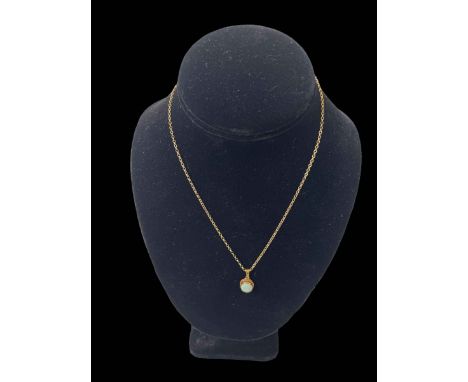 Opal pendant in 9 carat gold mount and with 9 carat gold chain.