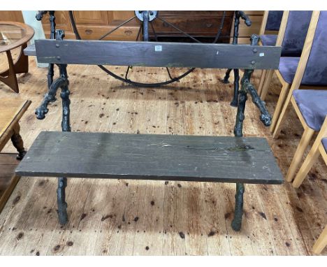 Cast naturalistic branch and stained wood garden bench, 88cm by 117cm.
