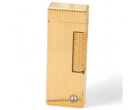 A Dunhill gold plated lighter, serial number 97966, in original boxVery good condition 