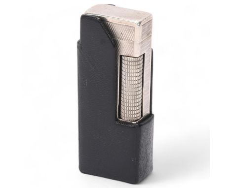 A vintage silver Dunhill Rollagas lighter, marked 925 to base with makers mark AD, engine turned body and Dunhill leather sli