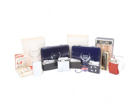 A collection of lighters, two boxed Ronson Centenary, boxed Zippo, Colibri etc. (8) 