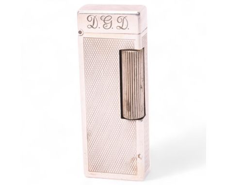 A vintage Dunhill silver plated Rollagas lighter, with unusual automatic flip-top mechanism, engine turned body, Swiss made, 
