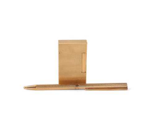 SJ Dupont, a 1980s' gold plated lighter and Ballpoint pen, with original fitted boxes and guarantee card