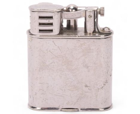 A vintage Dunhill silver plated lighter, makers marks to base, height 5.5cmA number of small dents at base, appears in untest