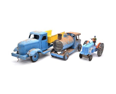 Three vehicles including Marx toy tractor; metal tipping truck; metal locomotive. Qty: 3