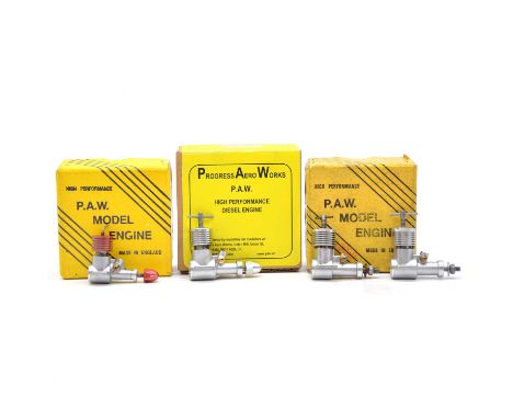 Four PAW aero model aircraft engines, including PAW 55 BR, boxed; PAW 06 Mk I, boxed; Paw 100 diesel, one boxed.Condition rep