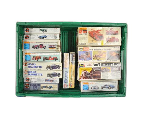 A tray containing fourteen model car kits, including Matchbox ref. PK-304 Jaguar SS/100, 1/32 scale; Airfix ref. 034429 Bugat