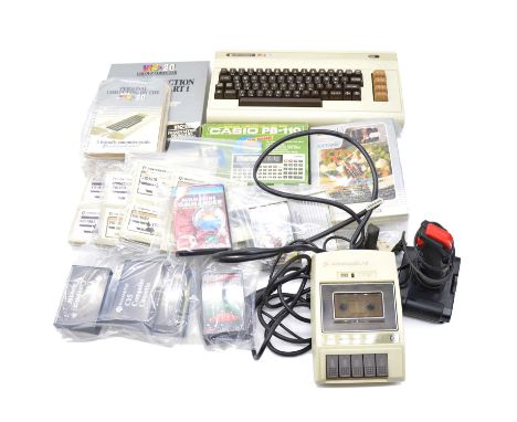 Commadore VIC-20 colour computer, with cables, joysticks, selection of cartridge software and games, cassette loader, cassett