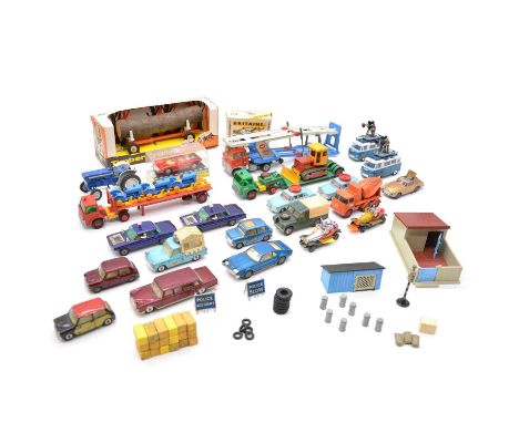 Twenty-four die-cast model vehicles, including Dinky, Corgi, Matchbox and others, includes Britains farm buildings and other 