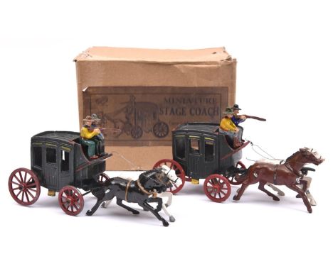 2 Johillco Stage Coaches. Both in dark green with red wheels, each has 2 brown and white horses, complete with driver and arm